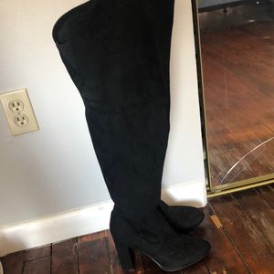 Thigh high black boots